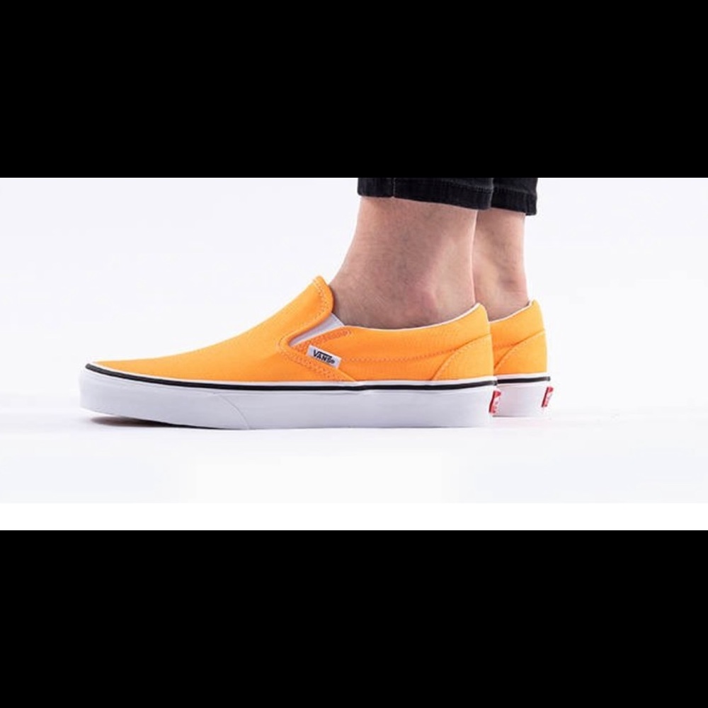 Neon orange slip on vans